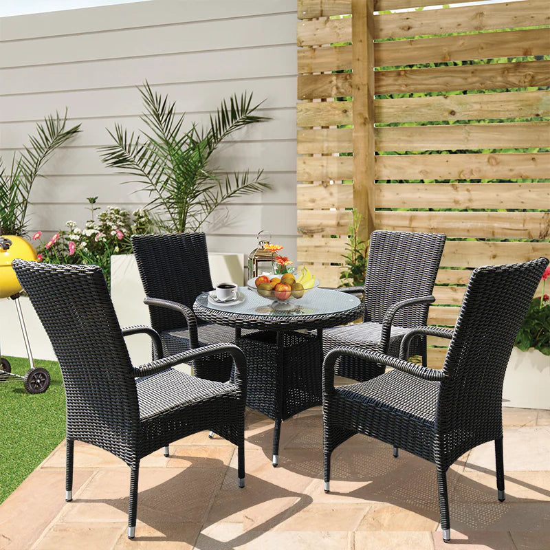 Harmony 5 Piece Outdoor Round Coffee Table and Stacking Armchair Set in Backyard Setting