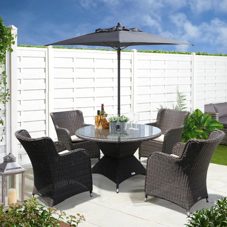 Bloomora Outdoor Dining Set Made of Rattan and Wicker in a Black Colour Backyard Photo with grass and unbrella