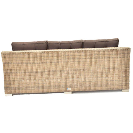 Beaumaris Rattan Wicker Outdoor Lounge Three Seater in Natural and Brown Color Front View Backyard Setting With Trees and Sun Umbrella