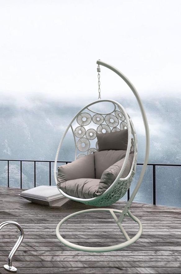Havana Hanging Egg Chair In White Wicker Colour with Patterns on Pod with Frame for balcony Front View on Decking